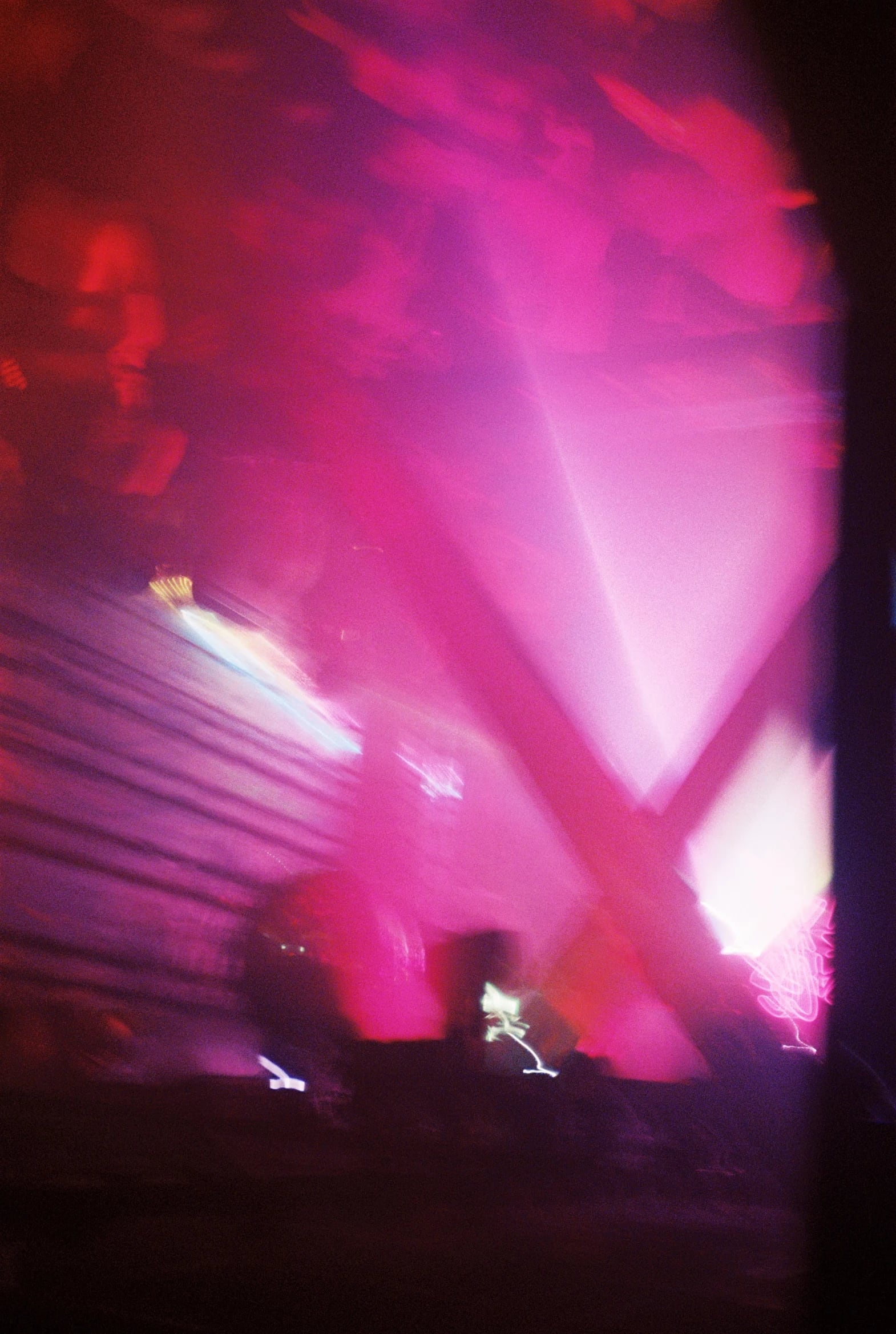 Abstract portrait in vivid pink light and motion