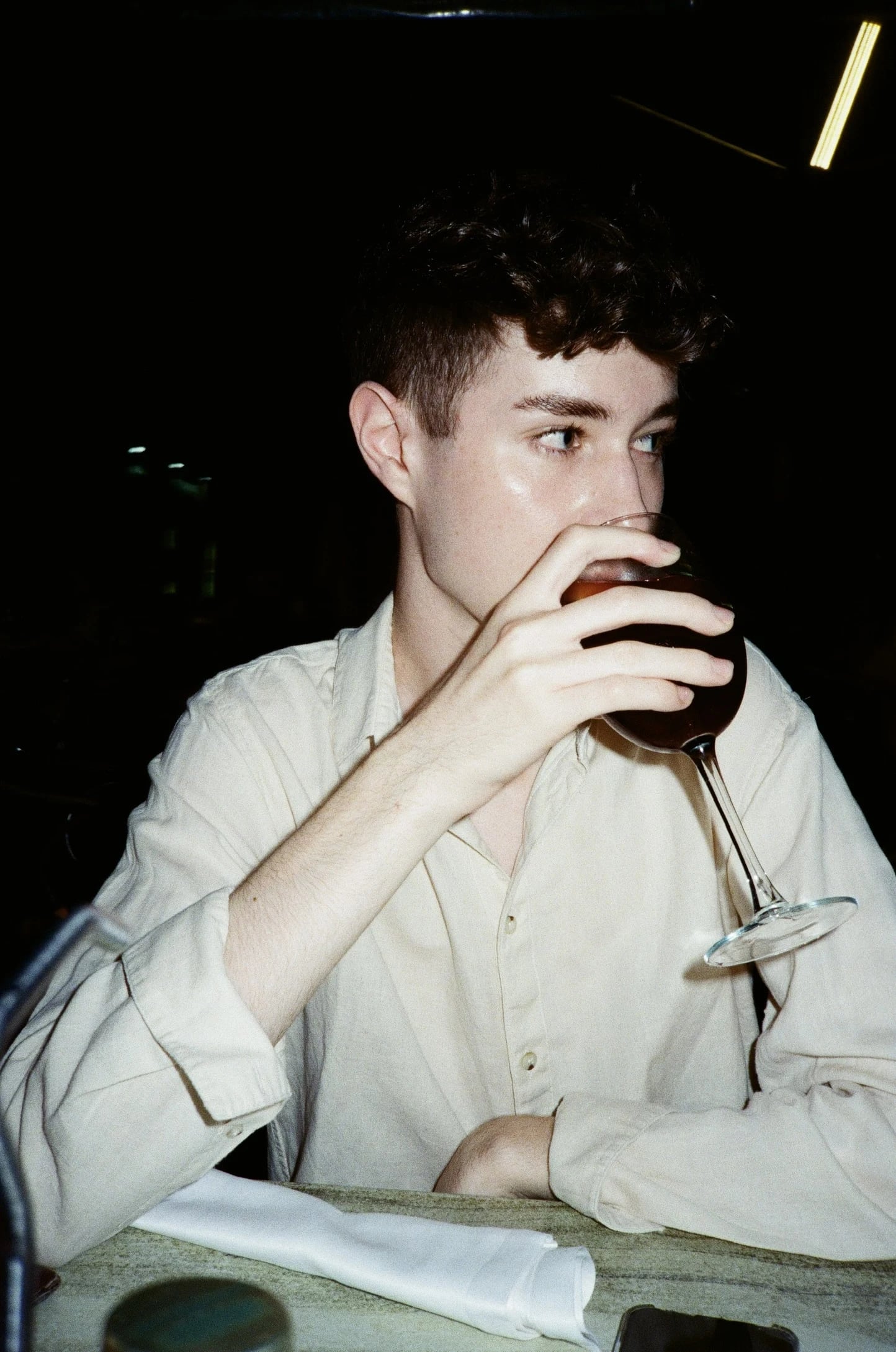 Flash portrait at a dinner table